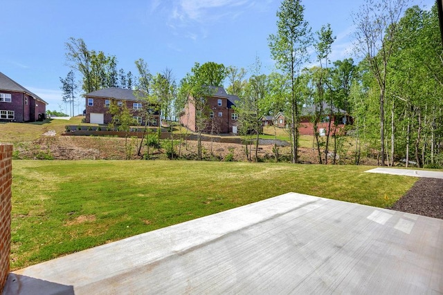 view of yard featuring a residential view