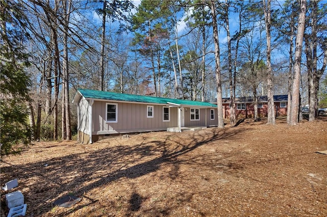 view of front of home featuring crawl space