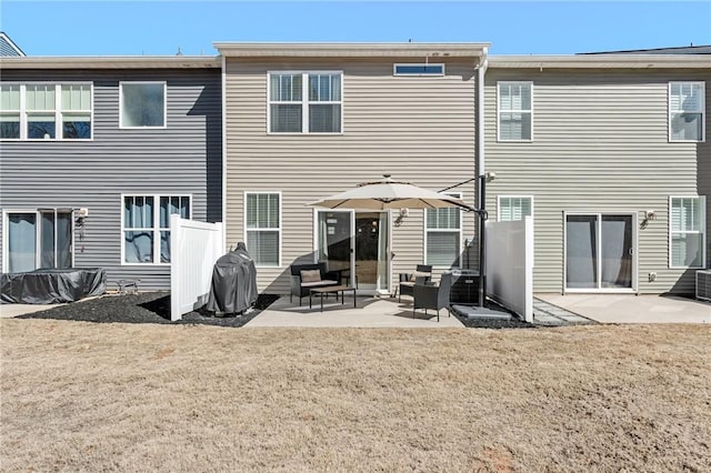 129 Rushing Creek Ln, Piedmont, SC 29673 - rear view of property with a patio and a lawn