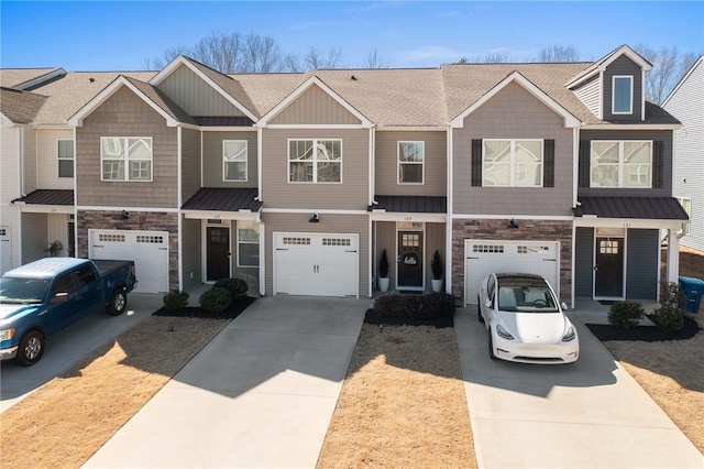 129 Rushing Creek Ln, Piedmont, SC 29673 - multi unit property with an attached garage, a standing seam roof, stone siding, and concrete driveway