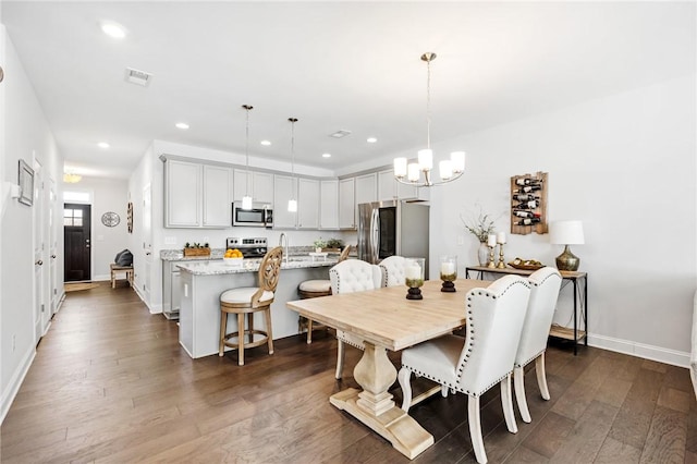129 Rushing Creek Ln, Piedmont, SC 29673 - dining space with a chandelier, recessed lighting, dark wood-type flooring, visible vents, and baseboards