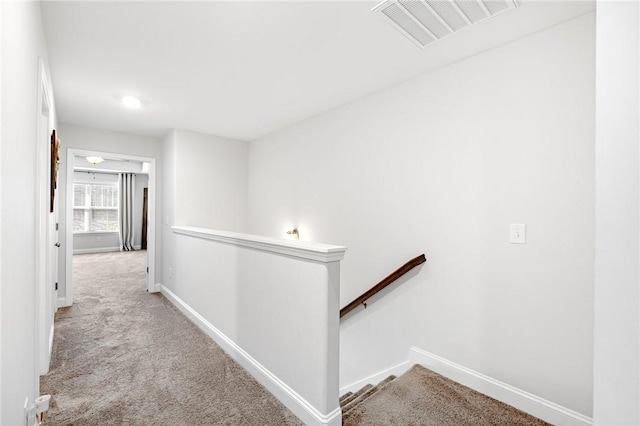 129 Rushing Creek Ln, Piedmont, SC 29673 - hall featuring baseboards, an upstairs landing, visible vents, and light colored carpet