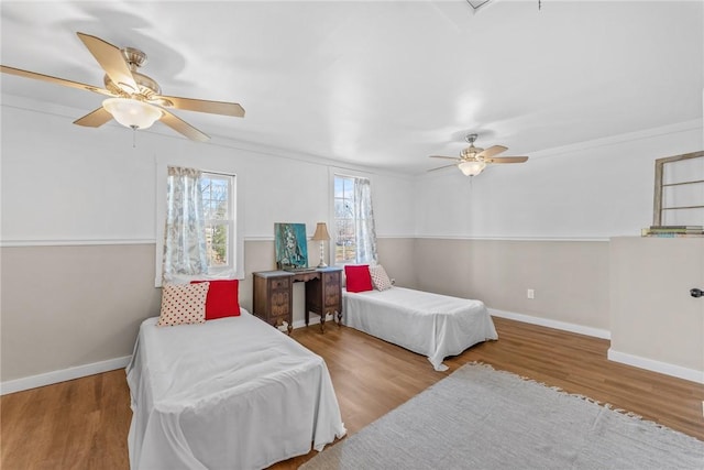 93 Parnell Rd, Abbeville, SC 29620 - bedroom with baseboards, wood finished floors, and ceiling fan