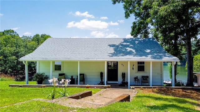 93 Parnell Rd, Abbeville, SC 29620 - view of front of property with a front yard, covered porch, and a shingled roof