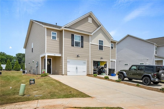 view of front of home with a garage, a front lawn, and concrete driveway