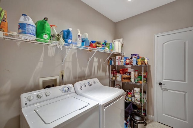 laundry area with washing machine and dryer and laundry area