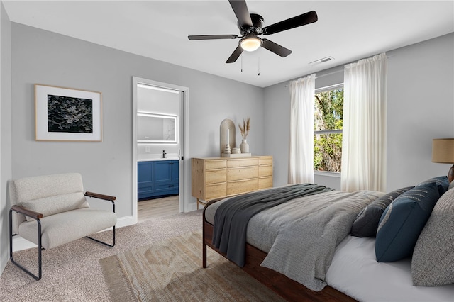 1507 Bennett Dr, Anderson, SC 29621 - bedroom featuring light carpet, a ceiling fan, baseboards, ensuite bathroom, and visible vents