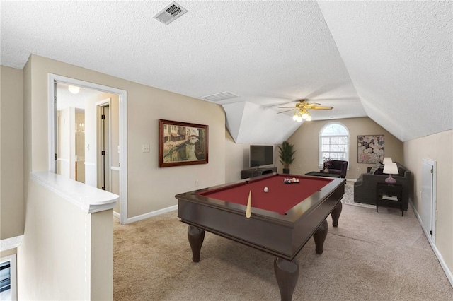 recreation room with a textured ceiling, light colored carpet, billiards, visible vents, and vaulted ceiling