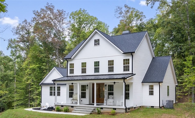 modern farmhouse featuring a chimney, a shingled roof, covered porch, crawl space, and a standing seam roof