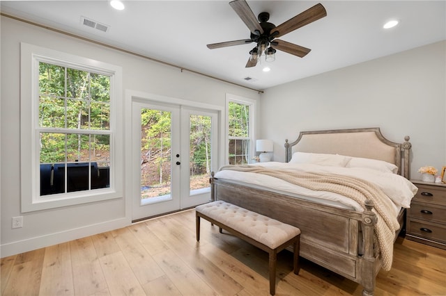 bedroom featuring french doors, recessed lighting, visible vents, light wood-style floors, and access to outside