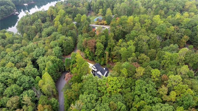 aerial view featuring a water view and a forest view