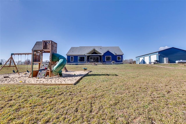 view of playground featuring a lawn