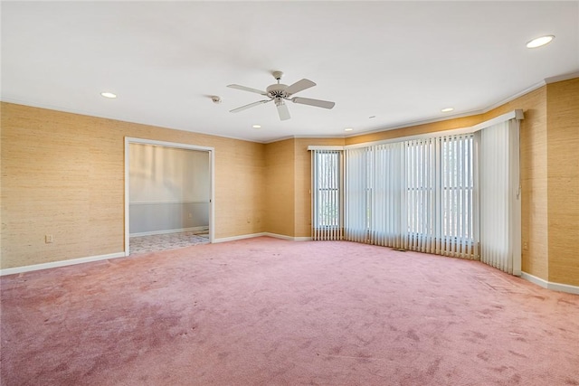 carpeted spare room featuring baseboards, a ceiling fan, and recessed lighting