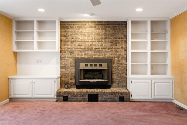 unfurnished living room featuring baseboards, crown molding, recessed lighting, and light colored carpet