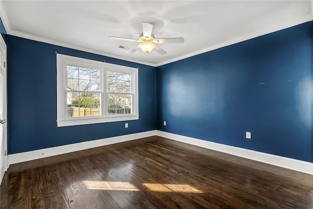 empty room with dark wood-style floors, crown molding, baseboards, and a ceiling fan