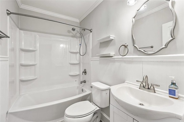 full bathroom featuring a wainscoted wall, crown molding, shower / bathing tub combination, toilet, and vanity