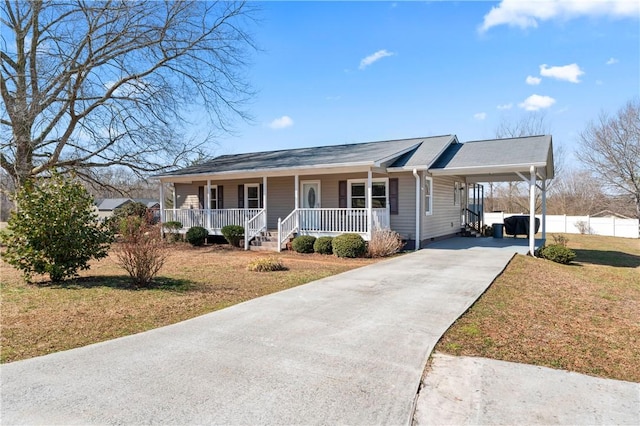 123 Bass Dr, Fair Play, SC 29643 - ranch-style home featuring a porch, crawl space, a front yard, concrete driveway, and a carport