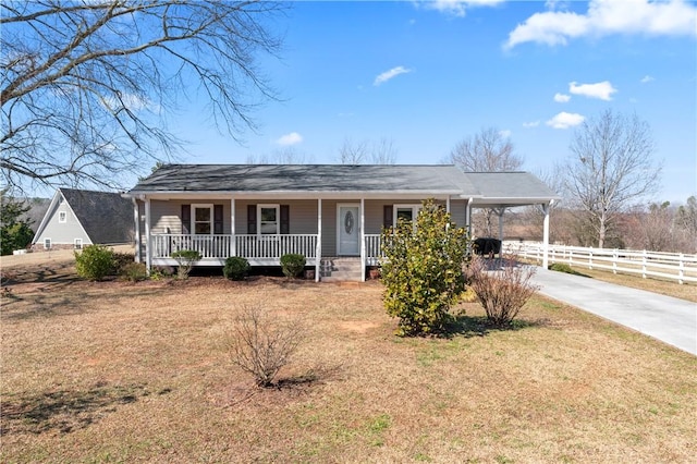 123 Bass Dr, Fair Play, SC 29643 - view of front of property featuring a front lawn, fence, a porch, driveway, and a carport