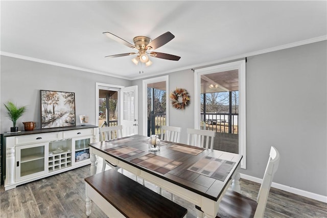 123 Bass Dr, Fair Play, SC 29643 - dining room with baseboards, ornamental molding, ceiling fan, and dark wood-style floors