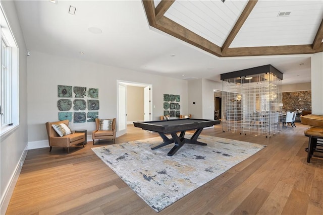 game room with vaulted ceiling with beams, pool table, visible vents, and light wood-style floors