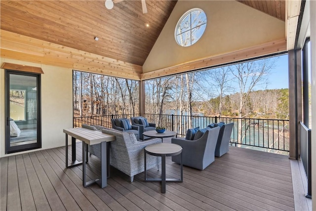 sunroom / solarium featuring wood ceiling and vaulted ceiling