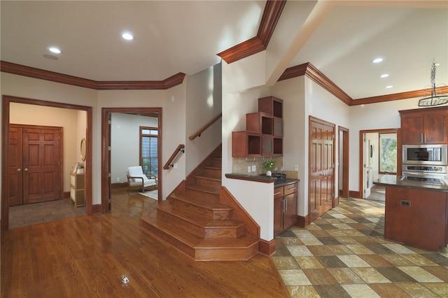 kitchen featuring open shelves, dark countertops, recessed lighting, appliances with stainless steel finishes, and baseboards