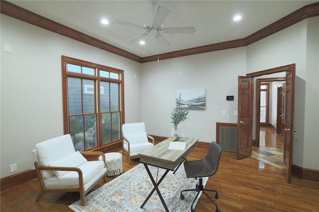 office space with baseboards, ceiling fan, wood finished floors, crown molding, and recessed lighting