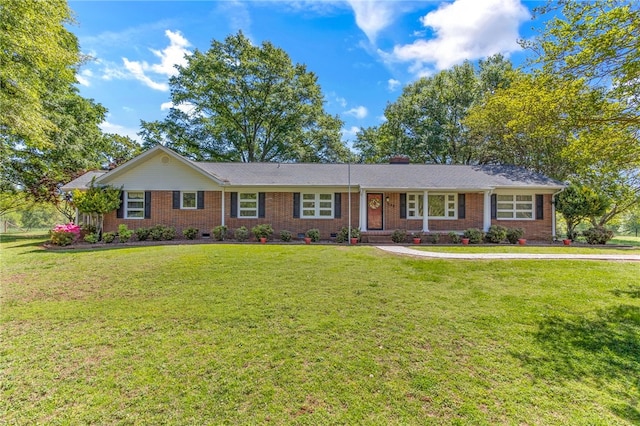 ranch-style home with crawl space, a front yard, and brick siding