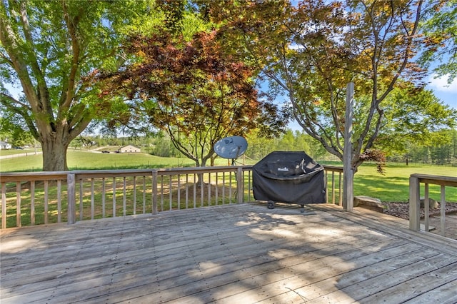 wooden deck with a yard