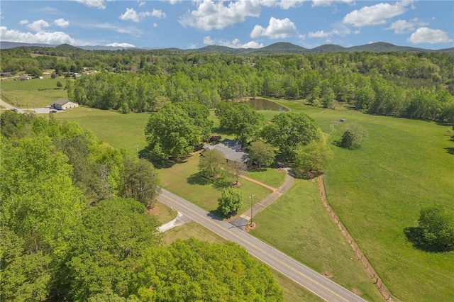 drone / aerial view with a rural view and a mountain view