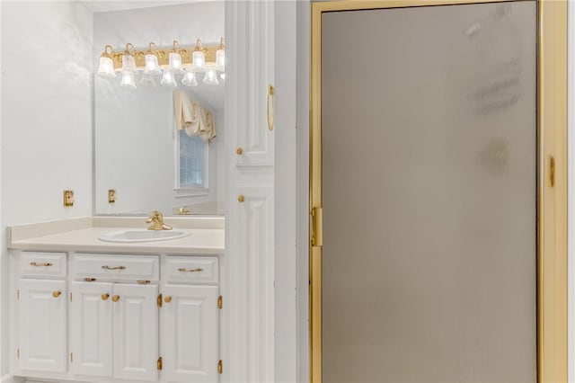 full bath featuring a stall shower and vanity