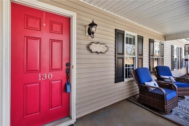 entrance to property with a porch