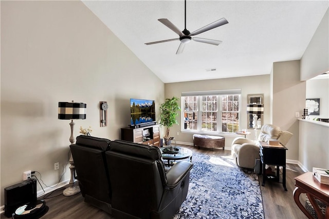 living room featuring visible vents, a ceiling fan, vaulted ceiling, wood finished floors, and baseboards