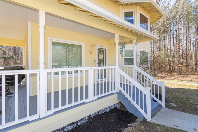 entrance to property with a porch