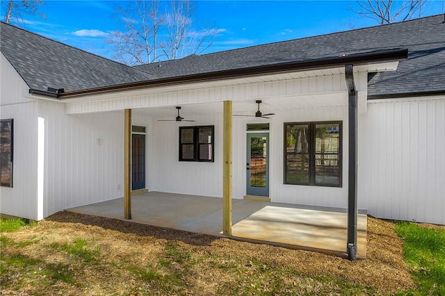 exterior space featuring a patio, a shingled roof, and a ceiling fan