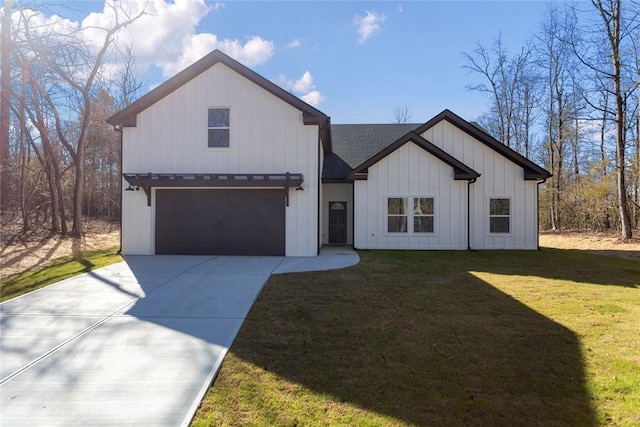 modern inspired farmhouse with roof with shingles, an attached garage, board and batten siding, a front yard, and driveway