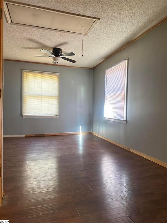 271 Piper Ln, Pickens, SC 29671 - spare room with attic access, a textured ceiling, wood finished floors, and ceiling fan