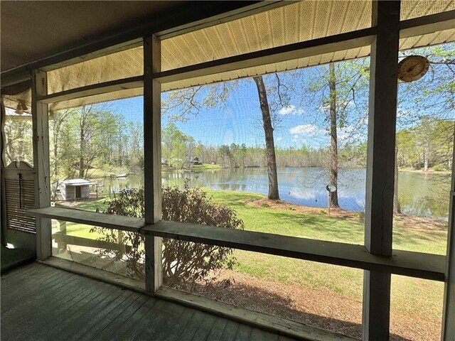 271 Piper Ln, Pickens, SC 29671 - unfurnished sunroom featuring a water view, view of wooded area, and healthy amount of natural light