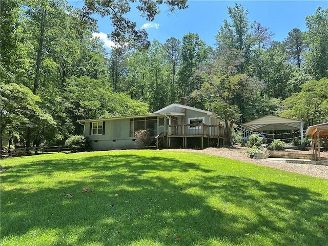 271 Piper Ln, Pickens, SC 29671 - rear view of property featuring a deck, a yard, crawl space, and a carport