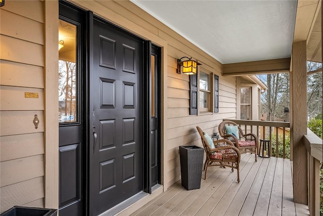 entrance to property with covered porch