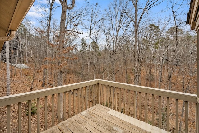 deck featuring a view of trees