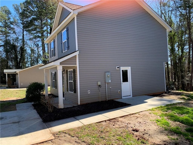 view of side of property with board and batten siding