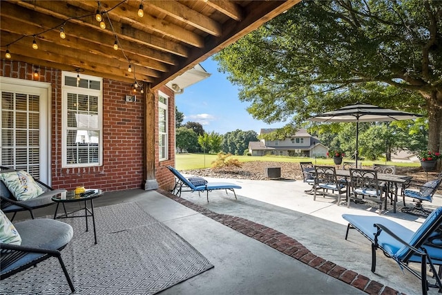 view of patio with outdoor dining area