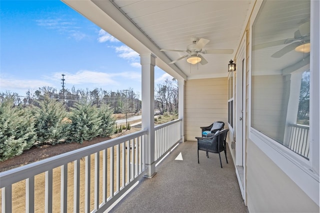 balcony featuring a ceiling fan