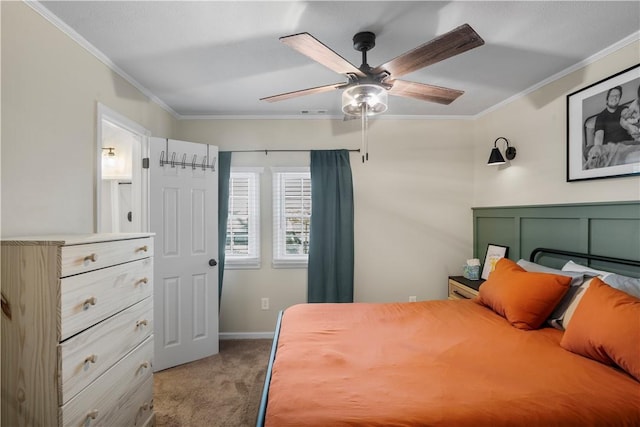 bedroom featuring carpet floors, crown molding, baseboards, and a ceiling fan