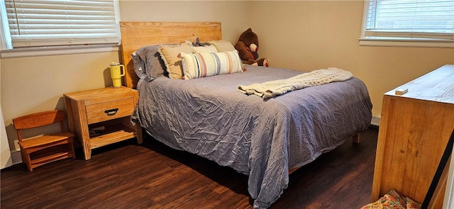 bedroom featuring wood finished floors