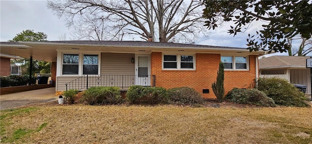 view of front facade featuring a porch, brick siding, driveway, crawl space, and a front lawn