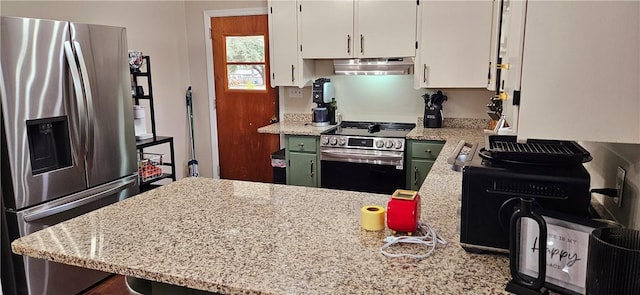 kitchen with white cabinets, under cabinet range hood, light stone counters, and stainless steel appliances