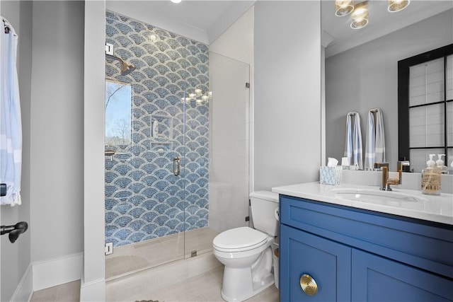 bathroom featuring tile patterned floors, a shower stall, toilet, and vanity