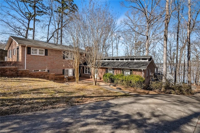 view of front of property featuring brick siding